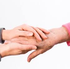 caregiver holding hands